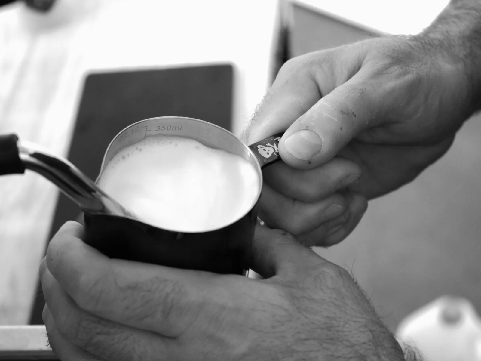 Artisan latte art from mobile coffee catering service